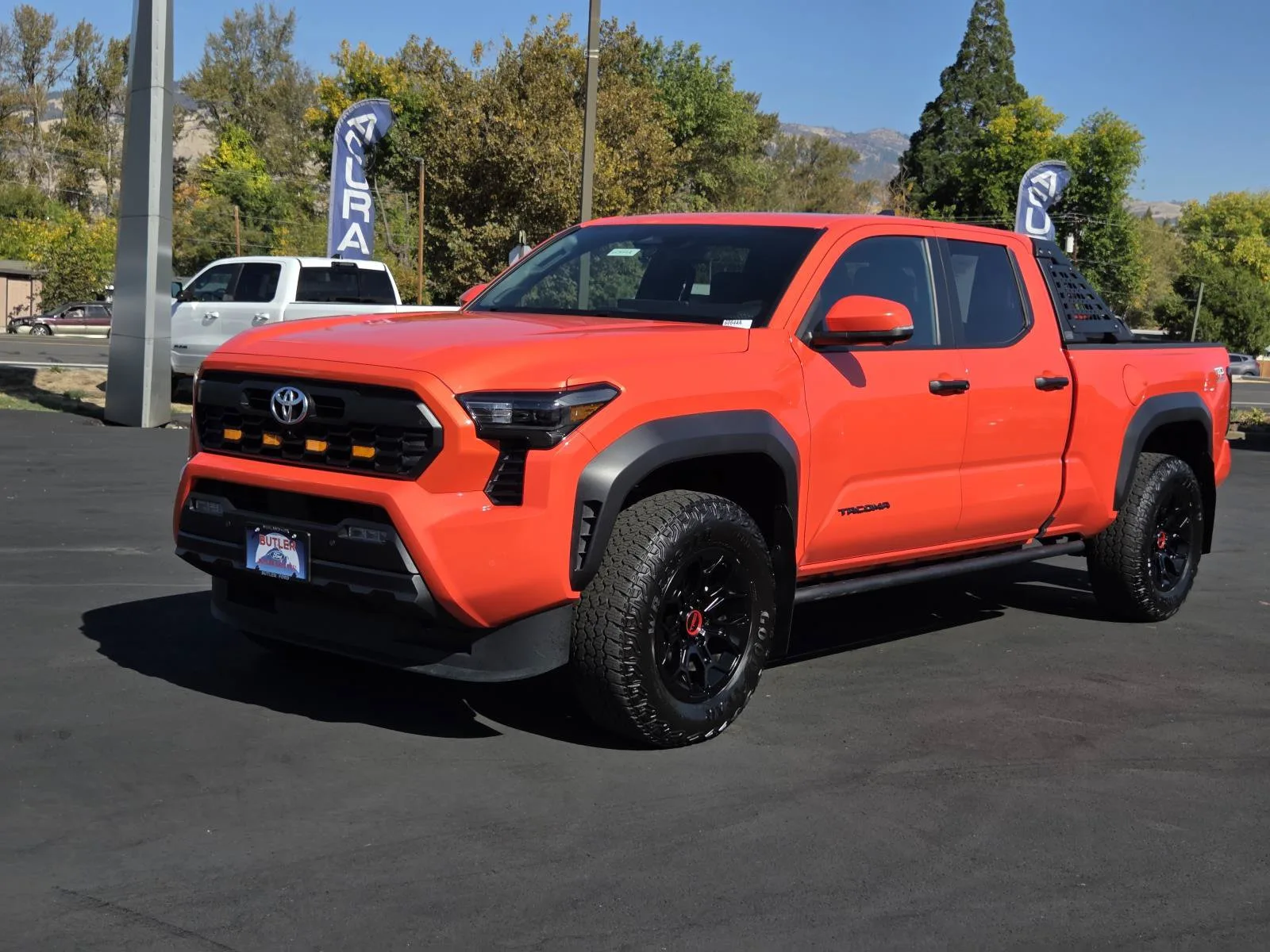 2024 Toyota Tacoma 4WD TRD Off Road in Solar Octane